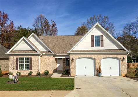 black metal roof on tan house|tan house what color brick.